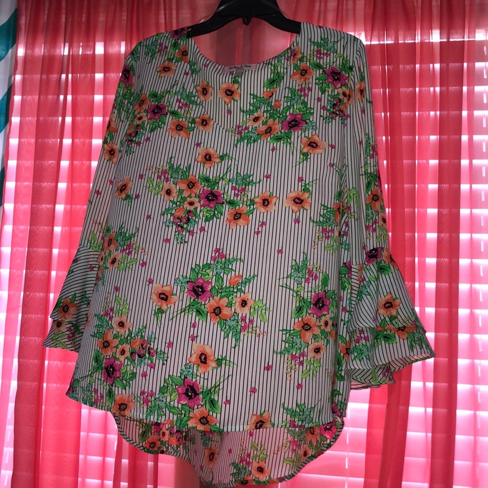 Black and white striped dressy top with floral